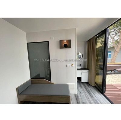 Cores personalizadas Contêiner Moderno Mini Férias Quarto Capsule Um quarto Estrutura de aço Hotel Projetado com estilo moderno