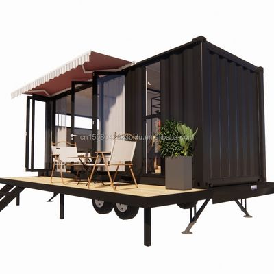 Casa de contêiner mini móvel moderna com estrutura de aço galvanizado de aço e rodas de material de painel de sanduíche