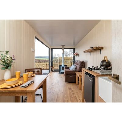 Casa de contêineres de luxo moderna pré-fabricada Vila de 40 pés Um quarto Uma cozinha Um banheiro Um salão para loja