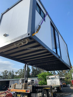 Container pré-fabricado luxuoso estilo residencial embalagem plana casa móvel com aparência de madeira estilo de design moderno
